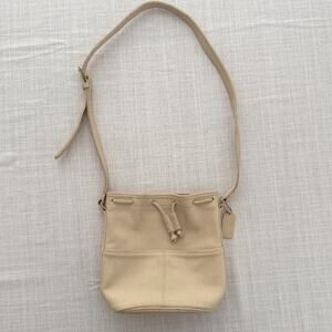 Coach | vintage bone cream cinch leather drawstring bucket purse handbag